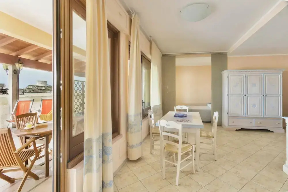 Residence with private beach in Bosa Marina