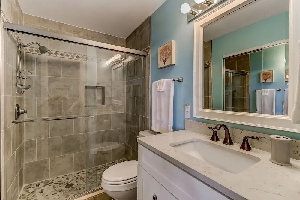 Newly Remodeled Oceanfront Condo with Salt Water Pool and Private Walkway to Beach by RedAwning