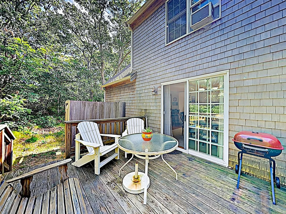 Woodsy Cape Cod Home by RedAwning
