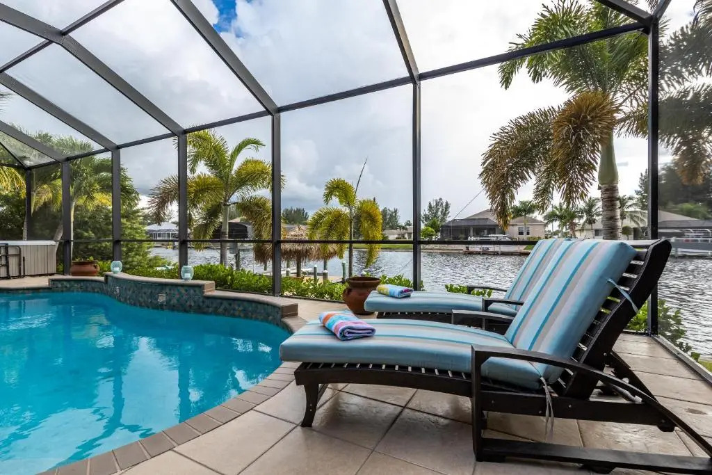 Villa Neptunes Grotto- BRAND NEW with heated Pool, Hot Tub, and dock with Tiki