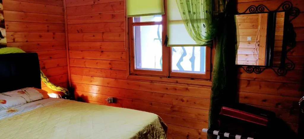 Ikos Olympus - Elegant wooden cabin house near the beach