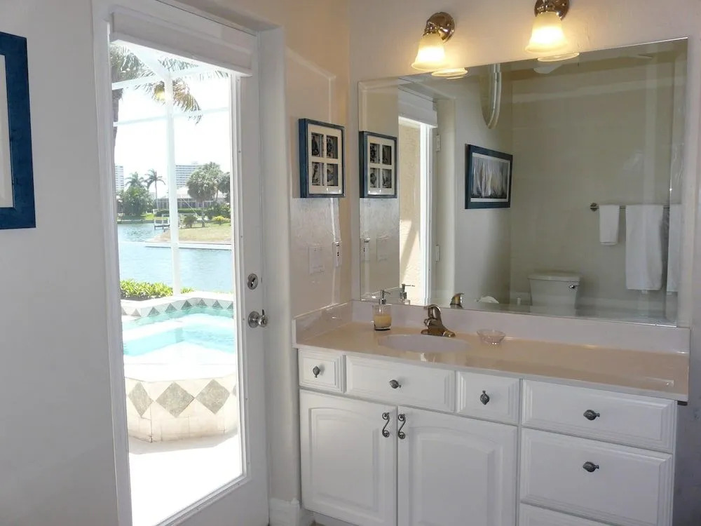 Waterfront home with pool, spa and walk to beach