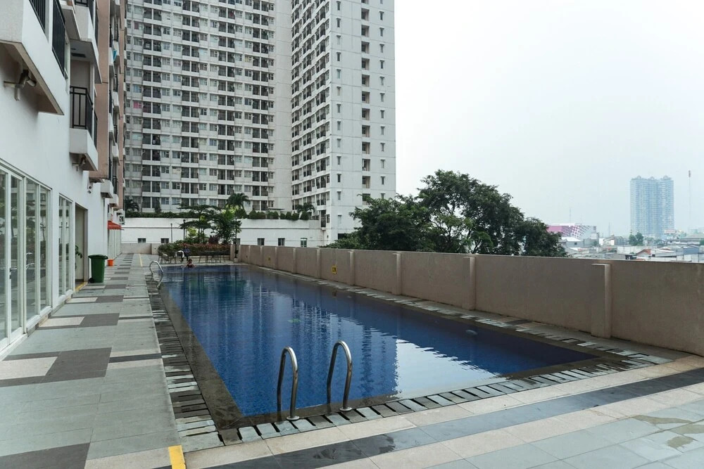 Elegant Design Studio Apartment at Margonda Residence 4 By Travelio