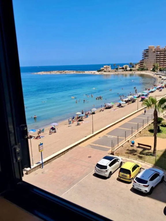 Beachfront 3BR Condo w Pool Views Sleeps 10