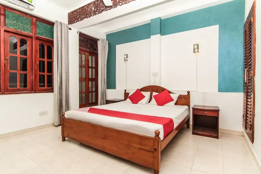 OYO 115 Qi Mag Apartments