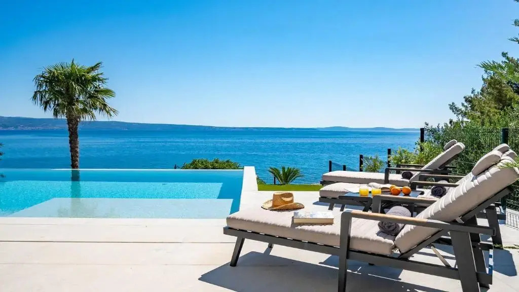 Seaview Villa ABA with 38sqm heated infinity pool, 4 bedrooms, Media room, 150m from sea