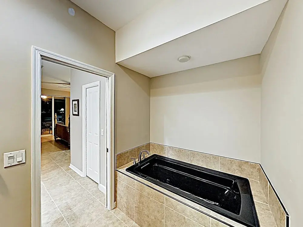 New Listing! Canal-side W/ Pool & Boat Dock 3 Bedroom Home