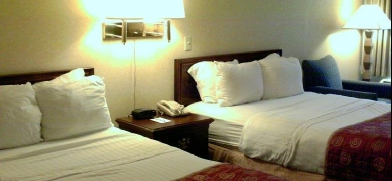 Merit Hotel & Suites