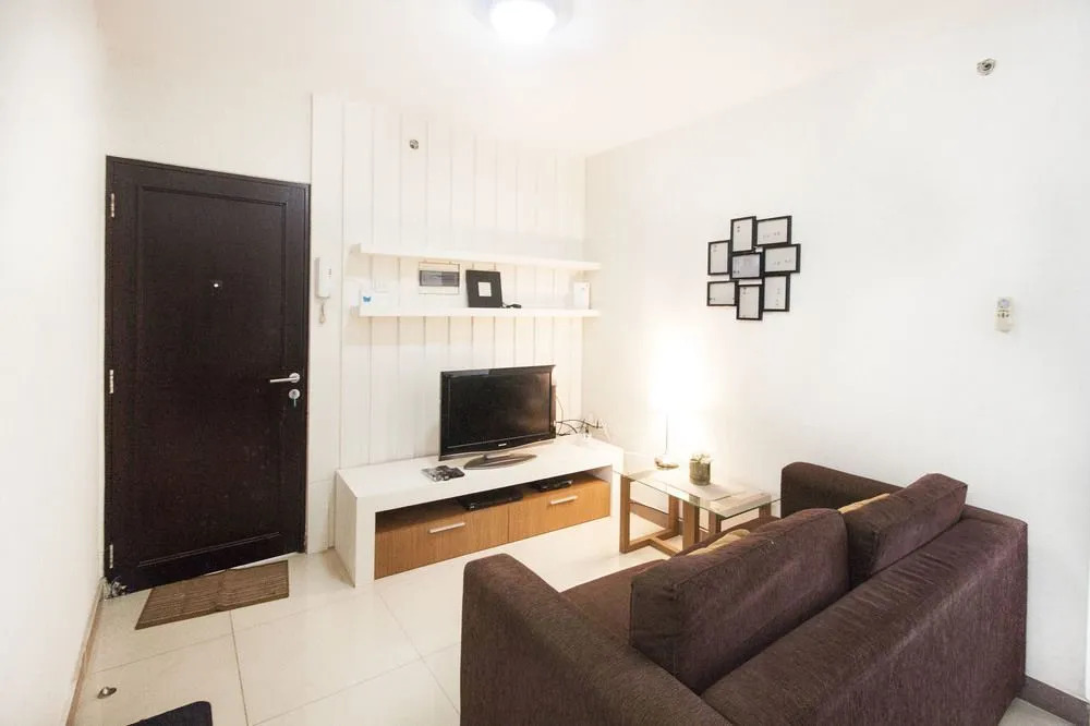 2BR Cozy at Empyreal Epicentrum Apartment By Travelio