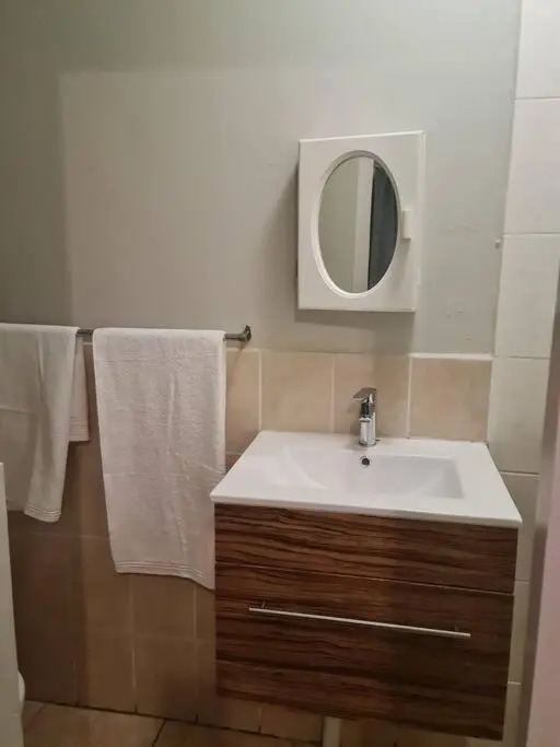 Justin's Place Lounge. An Exceptional Home with no Load Shedding, by The Grove Mall and Wilgers Hospital.