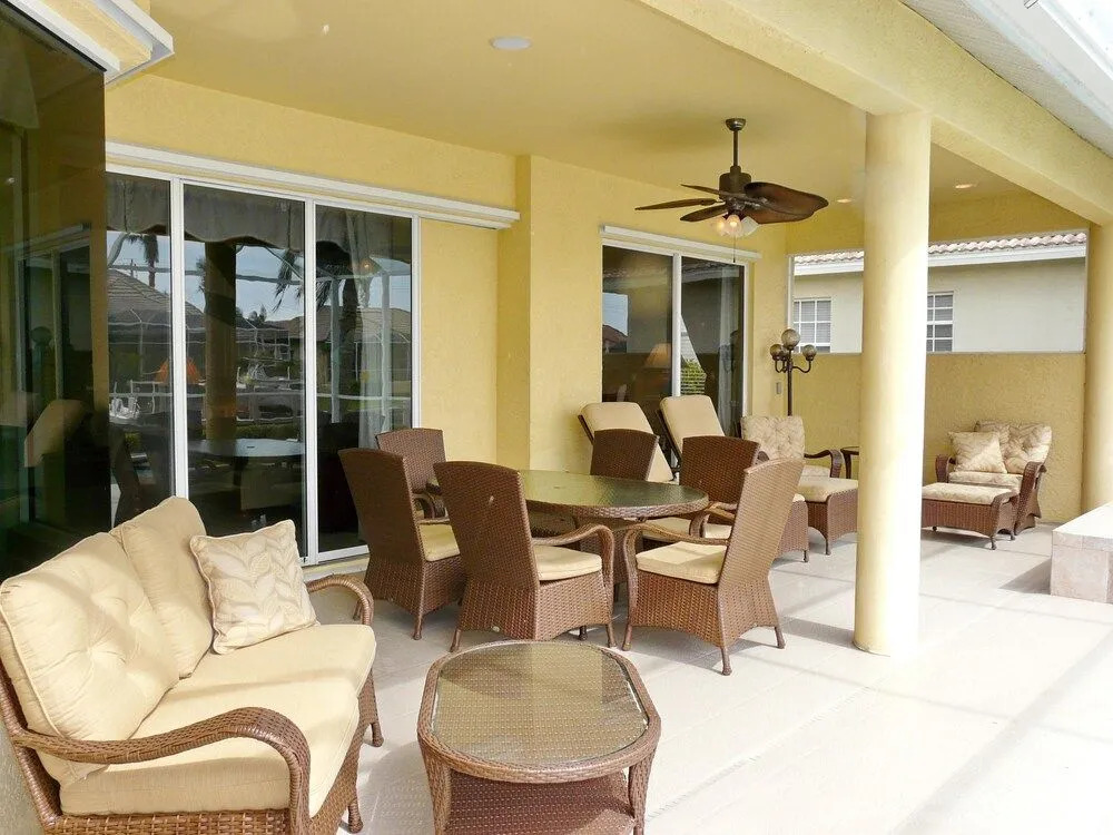 Large waterfront home with all-day sun on pool