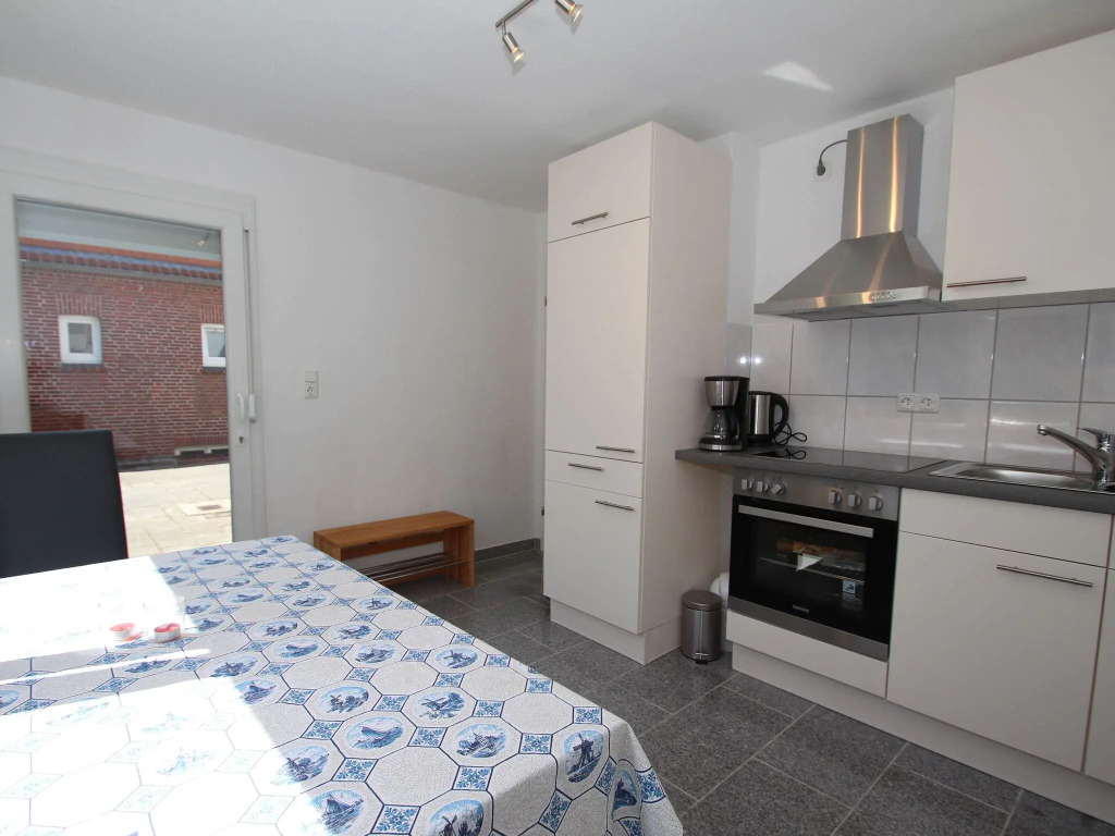 Apartment With a High Chair and bed