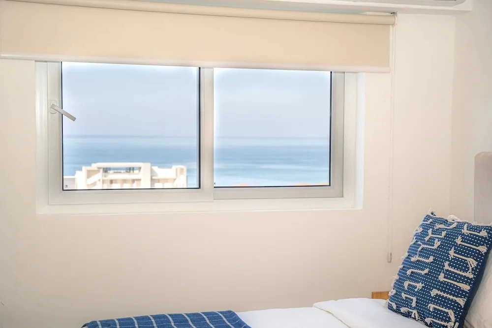 Ocean View Condo Steps to Beach & Comfort