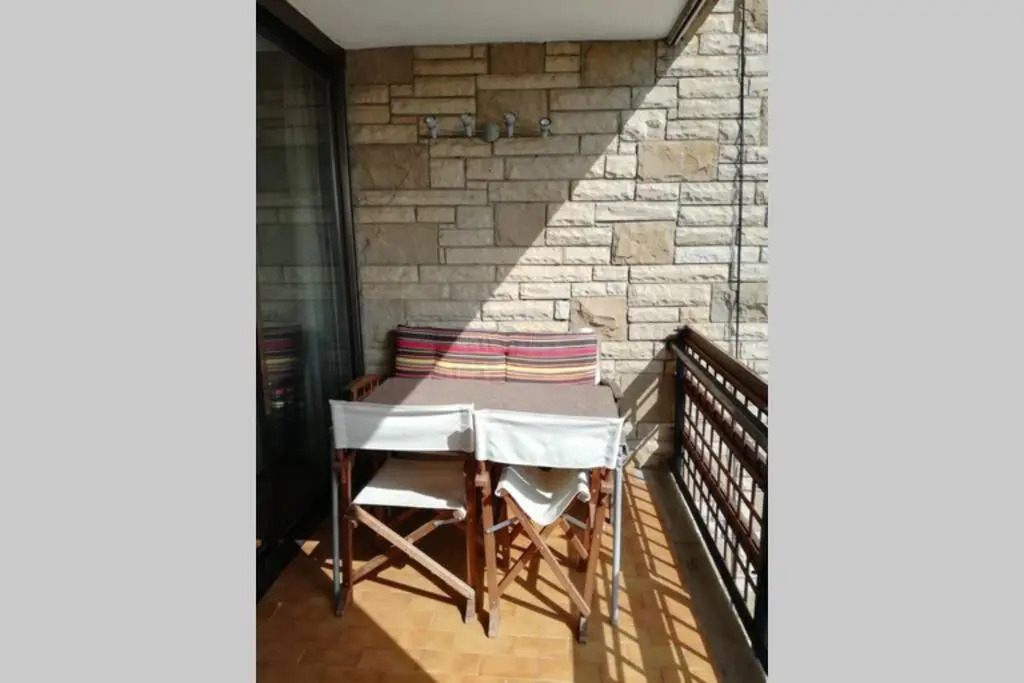 Apartament a Roses. Terrassa i piscina comunitaria