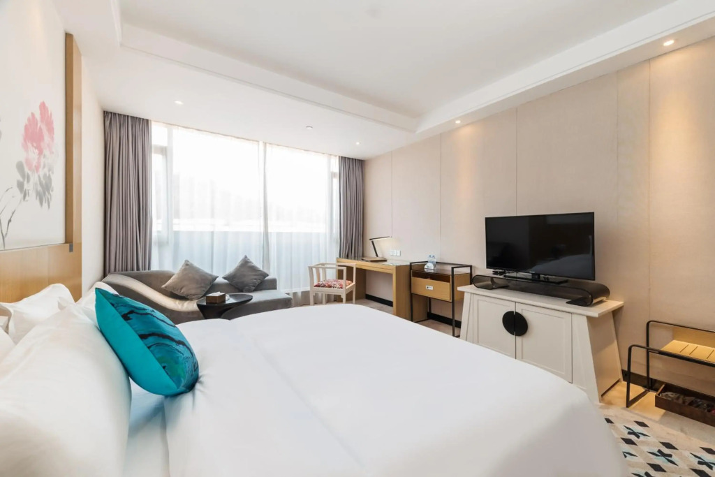 Paco Business Hotel Luo Gang Wan Da Branch