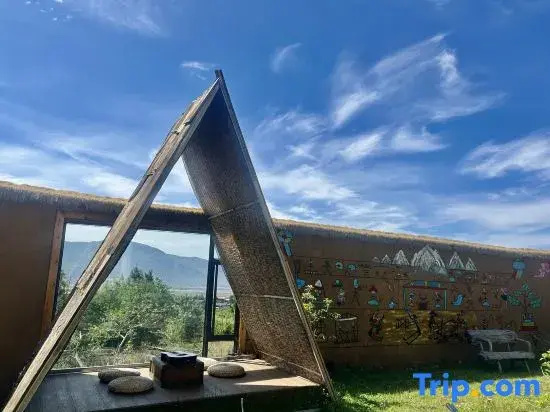 Listening to the wind · Courtyard Green Forest Rizhao Jinshan View Inn (Yulong Snow Mountain)