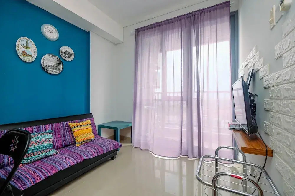 Homey and Comfortable 1BR Apartment at Royal Olive Residence