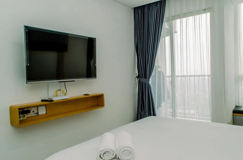 Nice and Elegant Studio near Campus at Pacific Garden Alam Sutera Apartment By Travelio