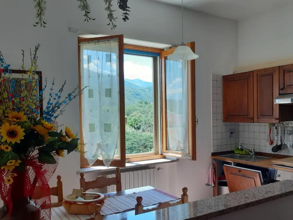 Bilocale Tití, soleggiato con vista montagne