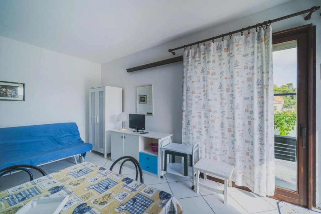 Porto 7B in a panoramic position with pool above the town of Porto Azzurro-IL PORTO CASA LEO