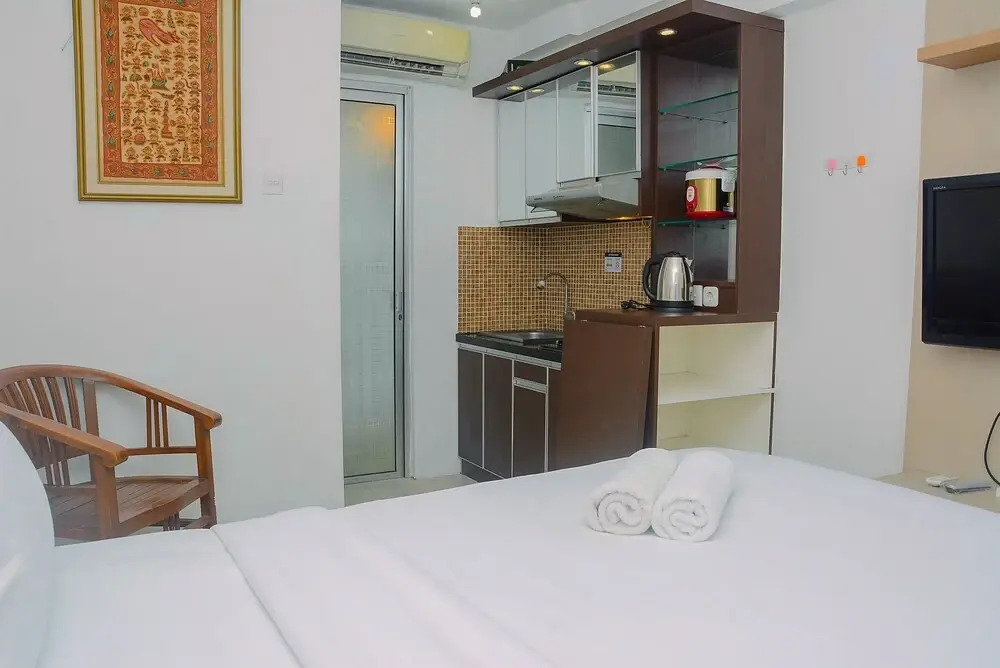 Comfort and Minimalist Studio Bassura City Apartment by Travelio