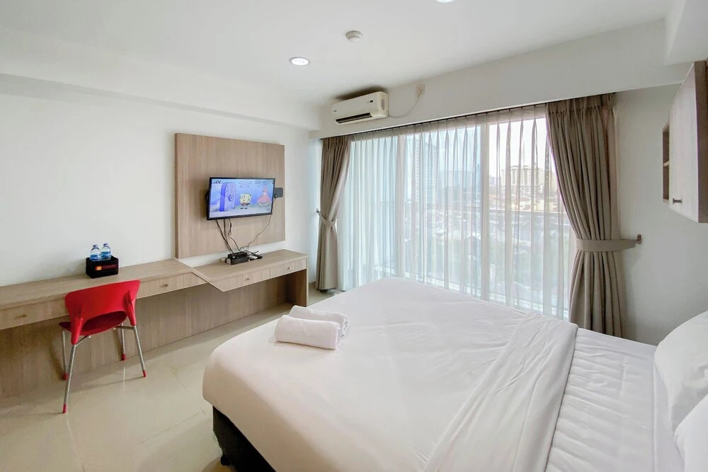 Homey And Cozy Living Studio At Tamansari The Hive Apartment