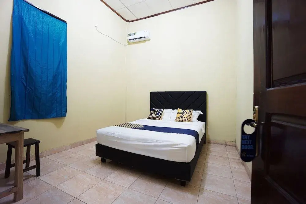 SPOT ON 2530 Tiga Mas Inn