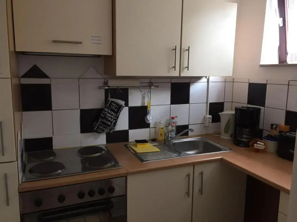 1 Zimmer Appartment im Basement links 108 A
