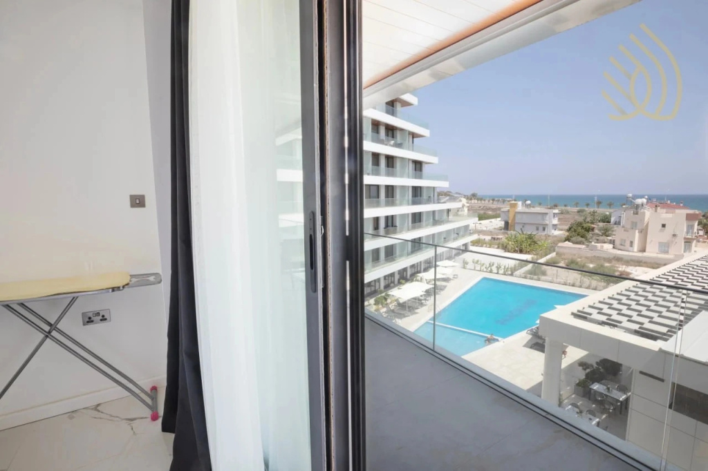 Апартаменты Stylish 1BR Sea View in Longbeach Iskele