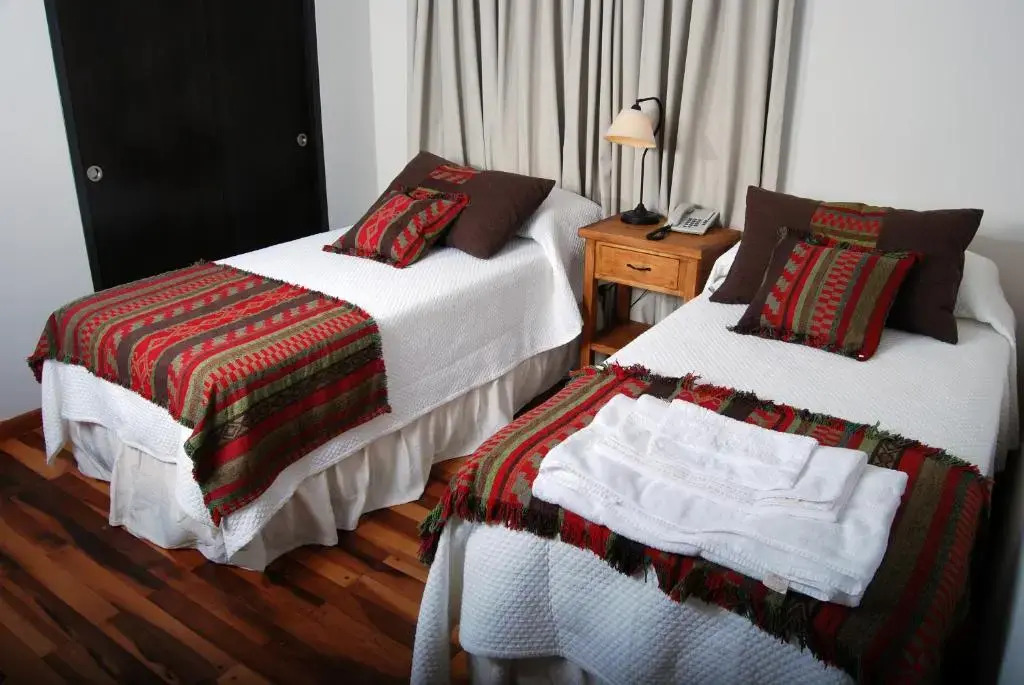 Río Arriba Suites & Apartments & Restó