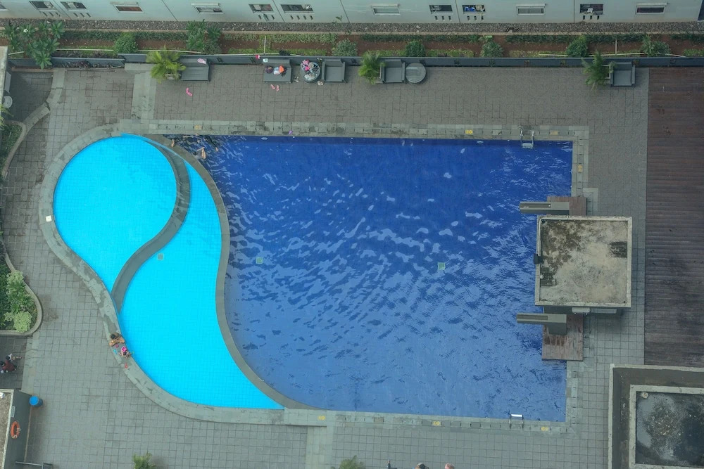 1 Bedroom at Green Pramuka Apartment by Travelio