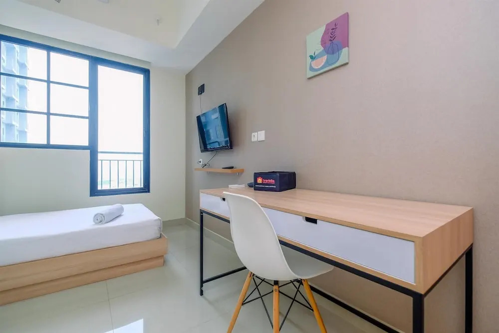 Nice 2Br At 26Th Floor Evenciio Margonda Apartment