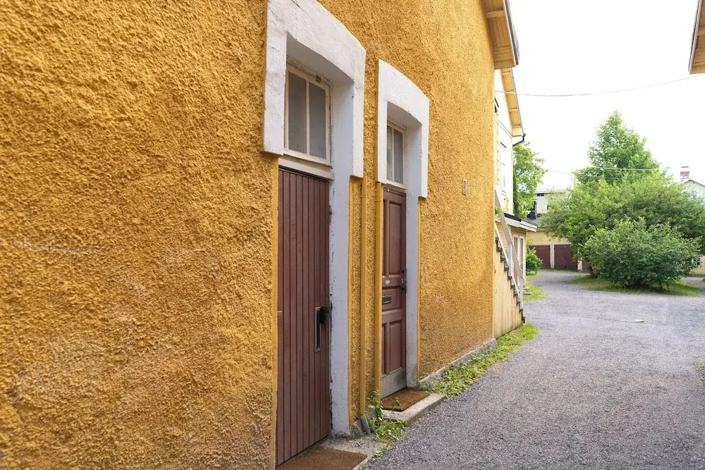 A bright wooden studio for four