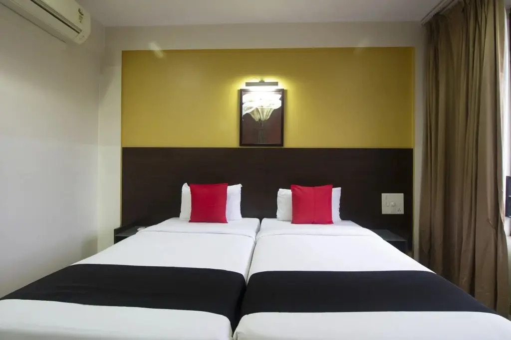 Shree Omkar Executive by OYO Rooms