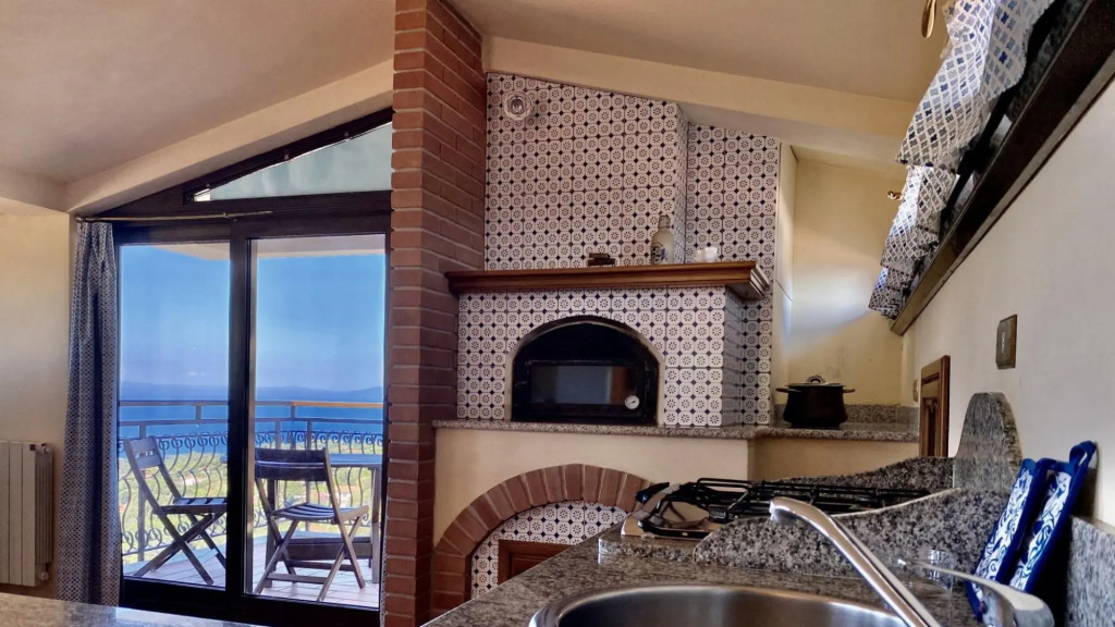 A few meters from the center of Capoliveri, attic penthouse with panoramic views-MANSARDA