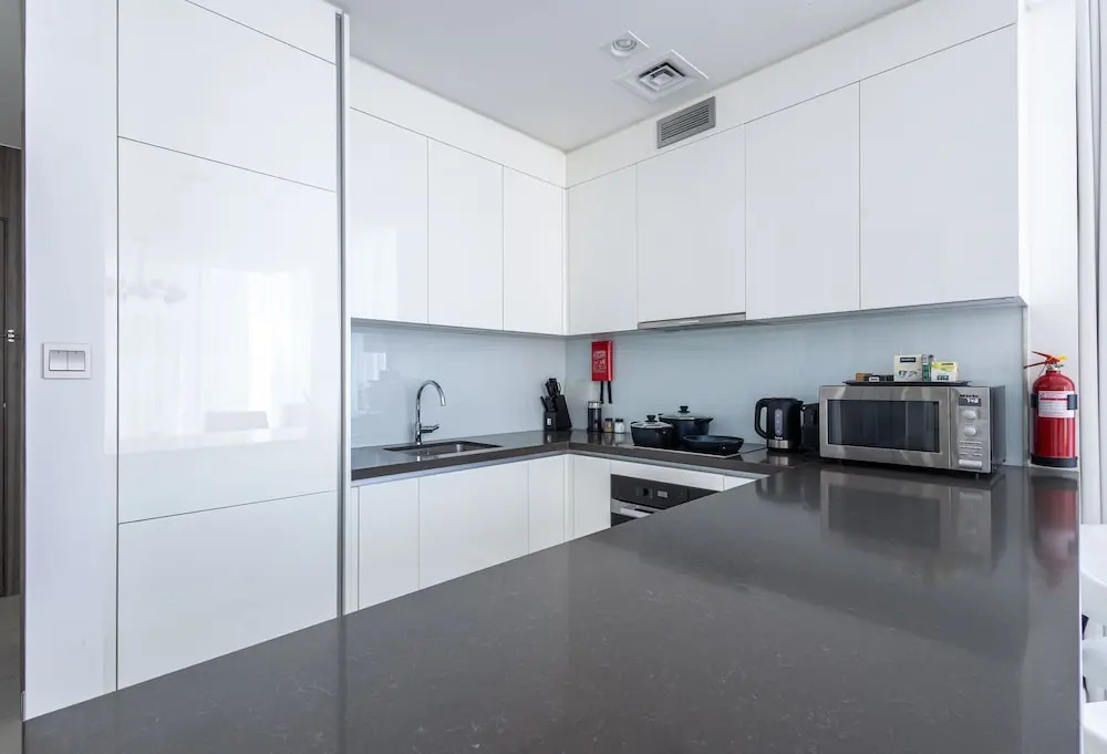 SuperHost - Serene 1BR in District One With Artificial Beach