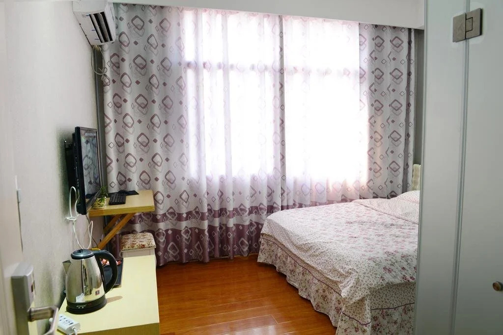 Aiqinhai Fashion Hotel