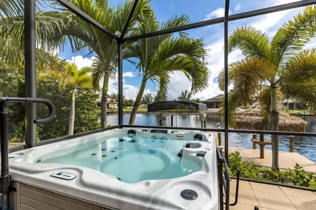 Villa Neptunes Grotto- BRAND NEW with heated Pool, Hot Tub, and dock with Tiki