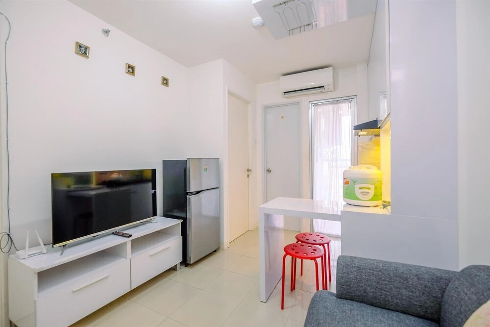 Alluring 2BR at Bassura City Apartment near Mall By Travelio
