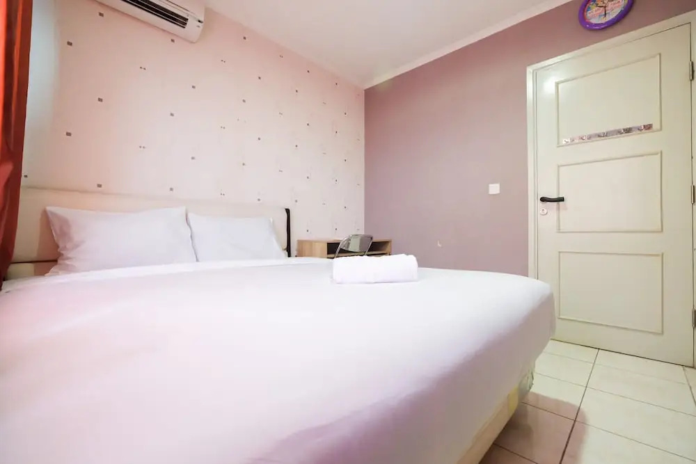 Modern 2BR at City Home Apartment with Sofa Bed near MOI