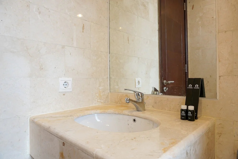 Elegant 2BR at The Empyreal Condominium Epicentrum Apartment