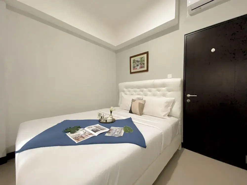 Minimalist And Cozy 1BR at Royal Heights Apartment