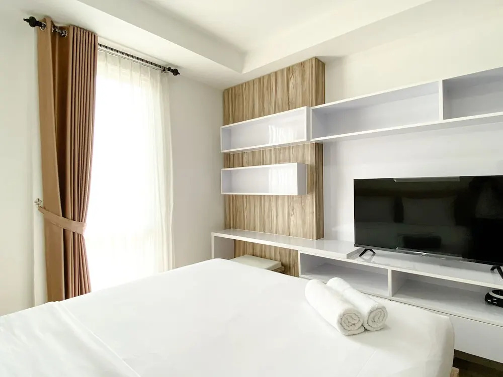 Homey And Compact Studio At Azalea Suites Apartment
