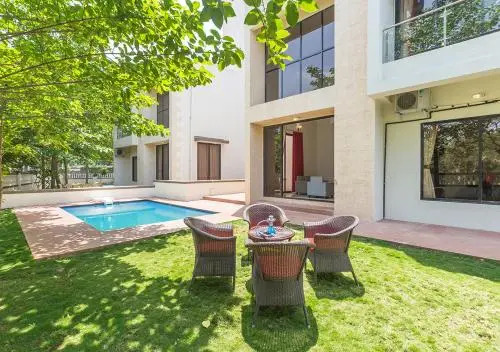 StayVista at Greenwoods Villa 8 with Private Pool, Terrace, Lift & Ping-Pong Table