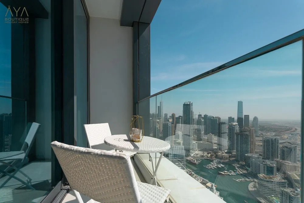 Aya - Canal View From this 1BR in Jumeirah Gate Tower 1