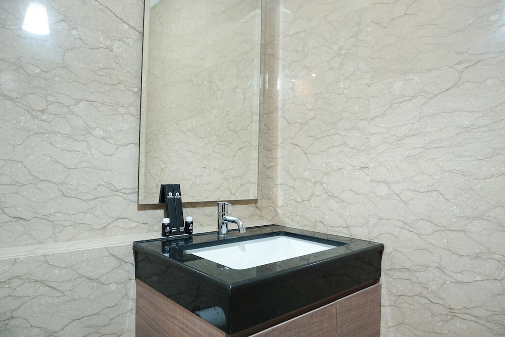 Luxurious 1BR @ L'Avenue Apartment near Sampoerna Universitas