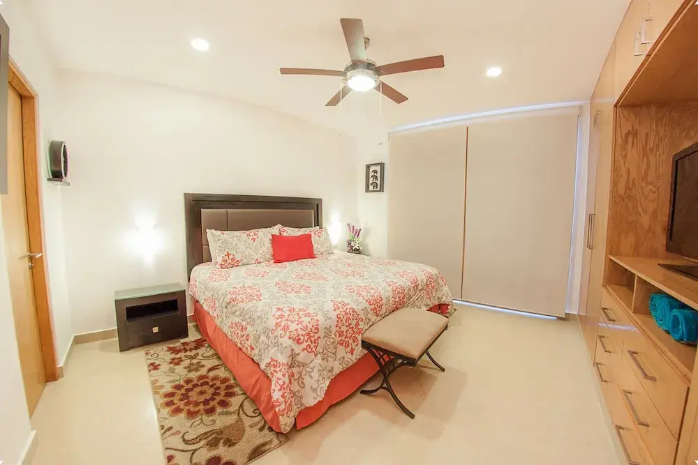 Fun and Relaxing  2BR PH steps away from the beach by Happy Address