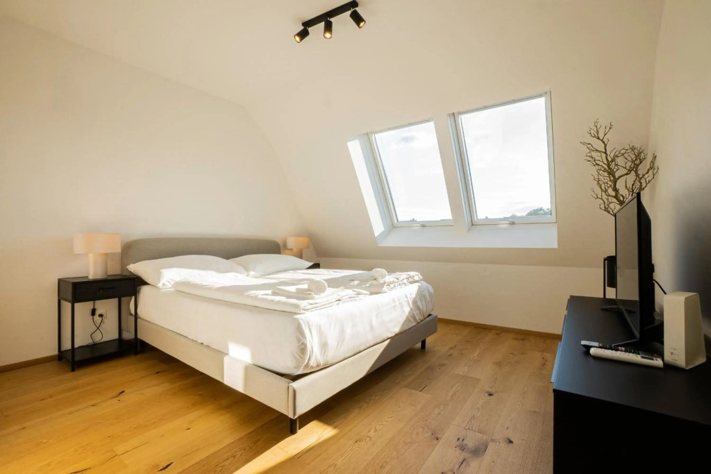 2-story penthouse with designer renovation for 2 people. A 15-minute walk to the city center