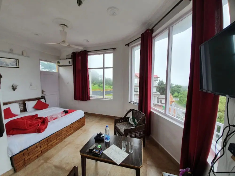 Goroomgo Hotel Aqua Waterfall Dharamsala