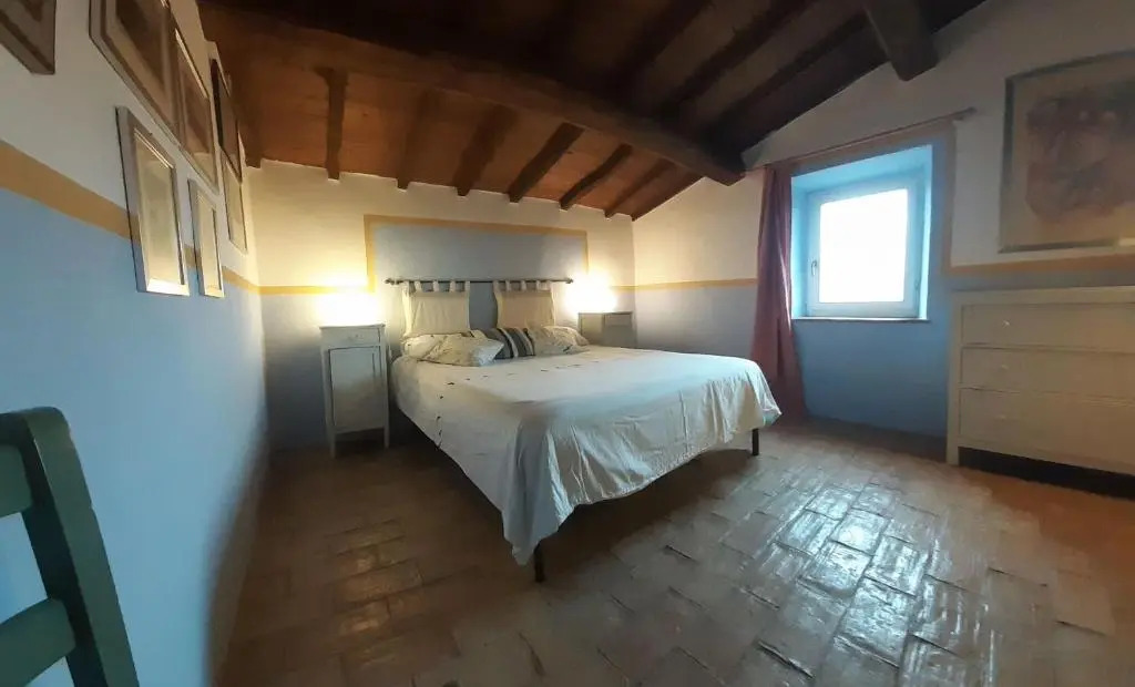 Casa del Piano Valle dei Calanchi in front of Civita Di Bagnoregio